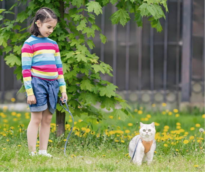young-girl-with-a-cat-in-a-garden